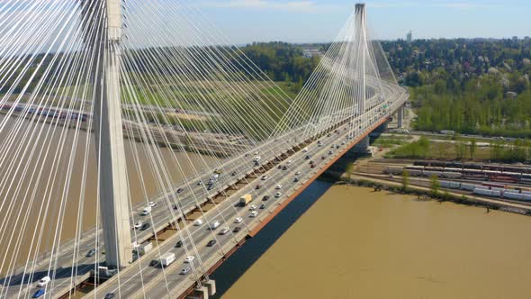 Flying around the Port Mann Bridge spanning the Fraser River in Coquitlam, British Columbia.