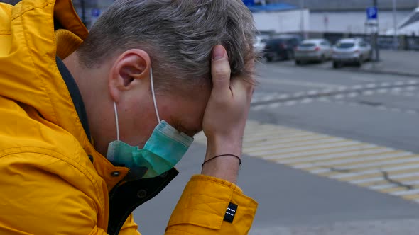 Sick Man in Medical Mask Outdoors