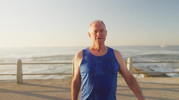 Senior man smiling on the promenade