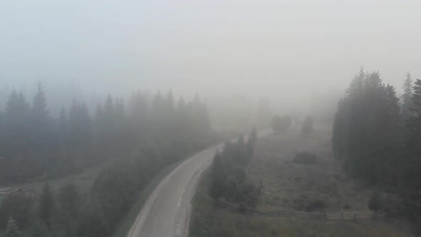 Foggy Morning in a Village Aerial View
