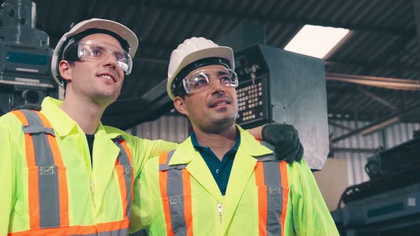 Happy Factory Workers Smiling and Standing Together with Friend