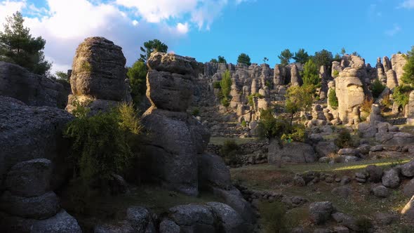 Aerial View of Valley with Picturesque Rock Formations on a Summer Day