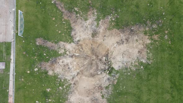 Chernihiv, Ukraine - 27.04.2022: War in Ukraine. A blown up football stadium as a result of a rocket