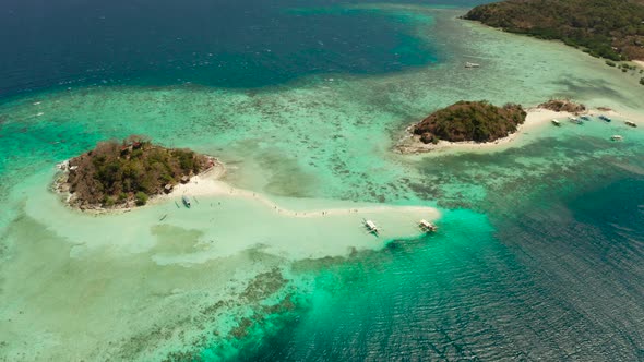 Small Torpic Island with a White Sandy Beach Top View