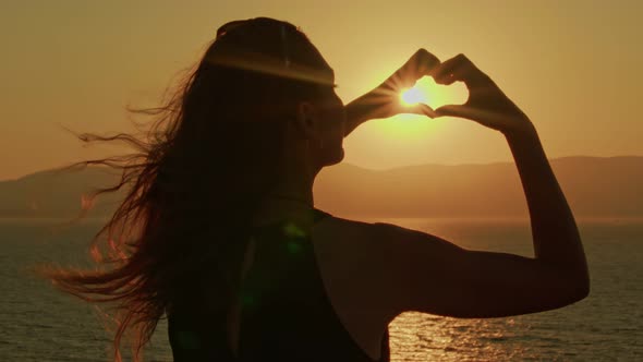 Woman Making Heart With Her Hands