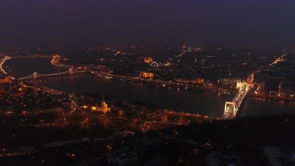 Aerial view of Chain bridge and river Danube in Budapest, Hungary at night.