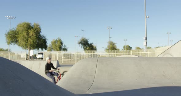 BMX rider in skatepark