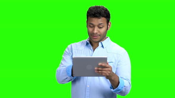 Happy Man with Tablet Pc Having Video Chat