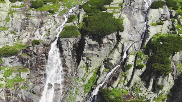 AERIAL: Ice Cold Water dropping from Waterfall in Slovakia