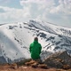 Man Sit on Rock in Spring Mountains - VideoHive Item for Sale