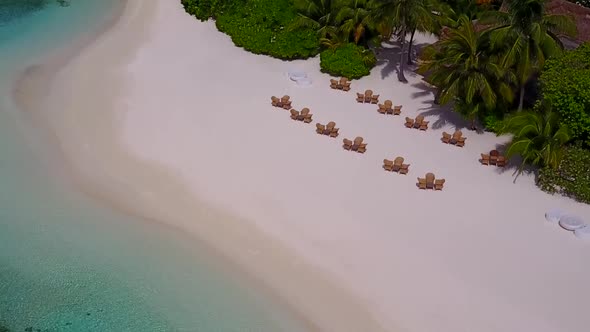 Drone aerial tourism of tourist beach by ocean and sand background