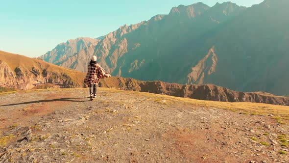 Cinematic View Of Female Traveller Excited On Vacation Enjoys Views