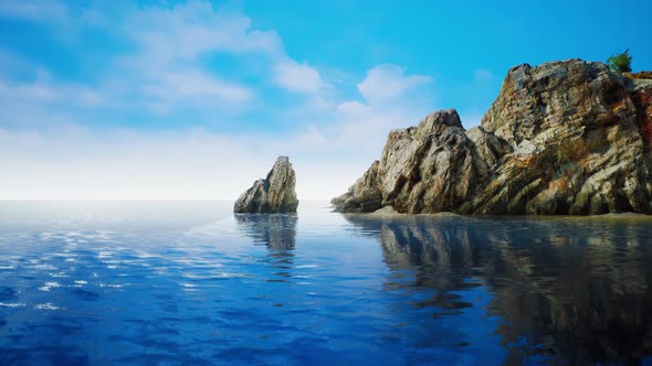 Summer View of Sea Caves and Rock Cliffs