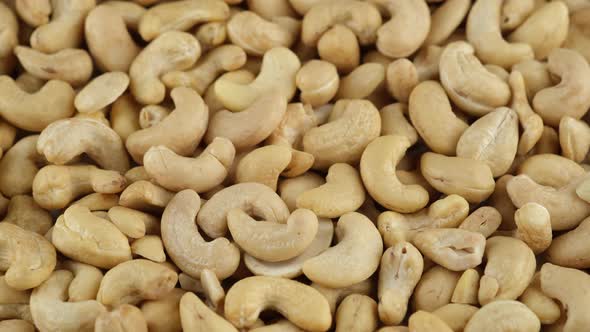 Cashew nuts close up, rotation. Healthy Food concept