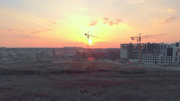 Sunset Building Construction Cranes