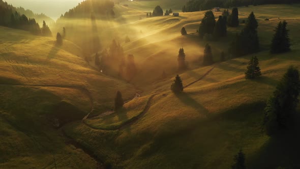 Aerial video of the sunrise in the Dolomites mountains