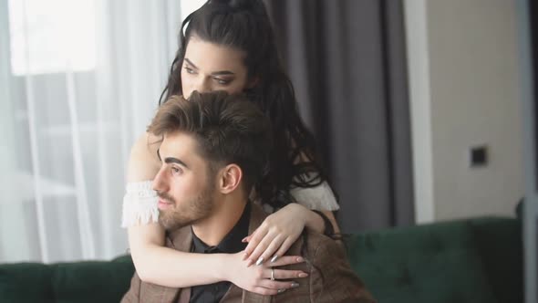 Couple Sitting on the Sofa