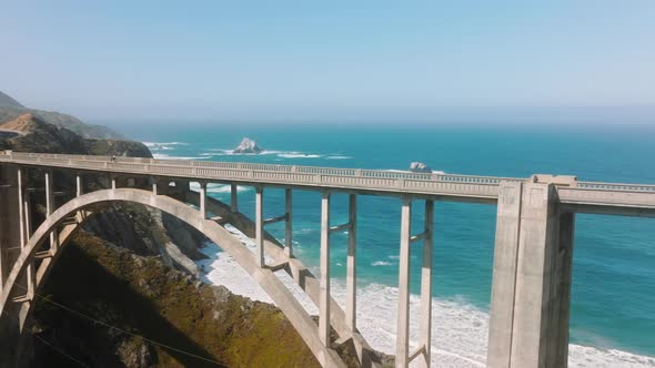 Scenic Road with Impressive Famous Ocean Coast viewsMoto Bike Riding By Bridge