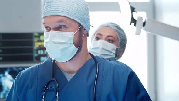 Professional medical doctors working in emergency medicine. Portrait of surgeon and the nurse.