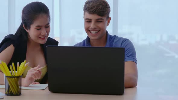 Creative Business People Group Having Conversation at Office Desk in Workplace