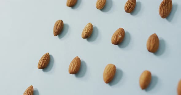 Video of almonds on blue background