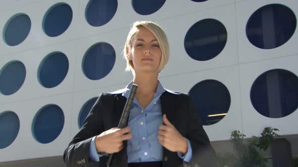 Portrait of female reporter getting ready for camera