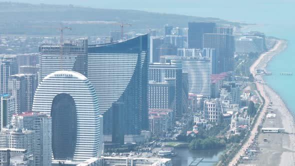 Batumi, Georgia - May 15 2022: Drone flies along new Batumi boulevard.