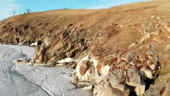 Rocky Coast of Frozen Lake in North Aerial View of Amazing Landscape Beauty of Nature