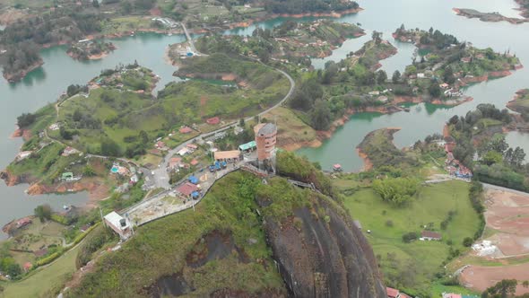 Guatape Rock Lookout Point Piedra Del Penol in Colombia - aerial drone shot