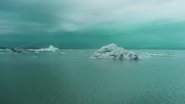 a small iceberg in the ocean