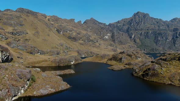 4k aerial drone footage over the 5th lagoon of Pichgacocha from Ambo, Huanuco, Peru in the Andes mou