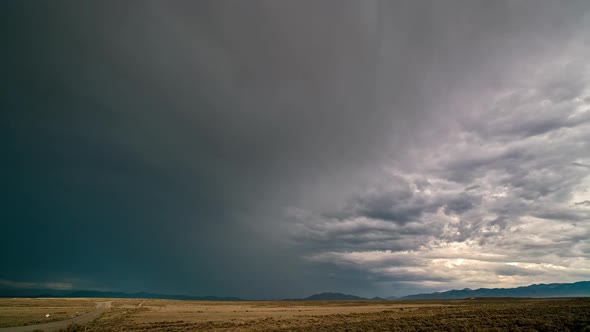 Timelapse of severe storm passing over the desert landscape in Utah alt