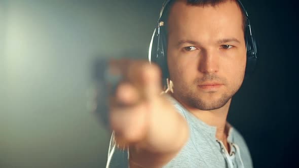 Man Shooting with Gun at a Target