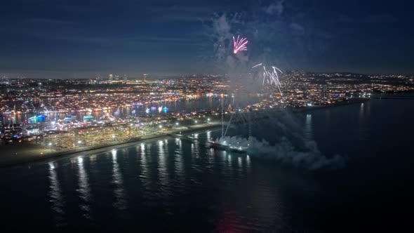 Enjoying Scenic Fireworks Above Ocean New Year Celebration California Night