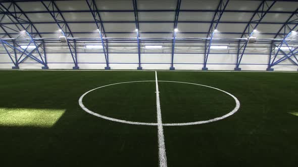 Empty Indoor Football Field with Marking at Sports Center