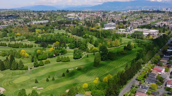 Verdant Golf Course In Neighbourhood Of Oakridge In Vancouver, Canada. aerial