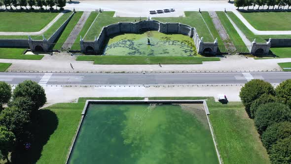 Aerial View of Medieval Landmark Royal Hunting Castle Fontainbleau and Lake with White Swans, France