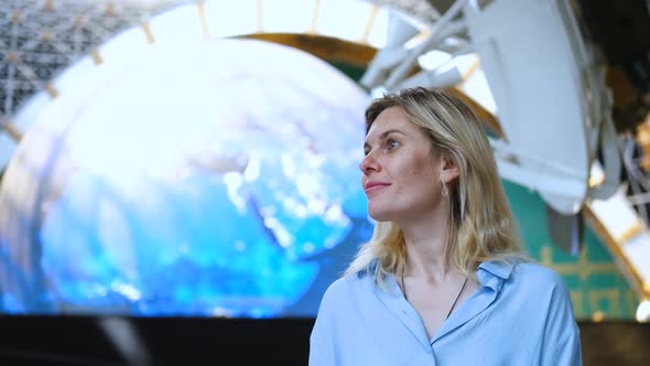 portrait of smiling woman in space center