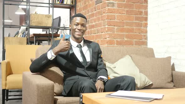 Thumbs Up By Black Businessman