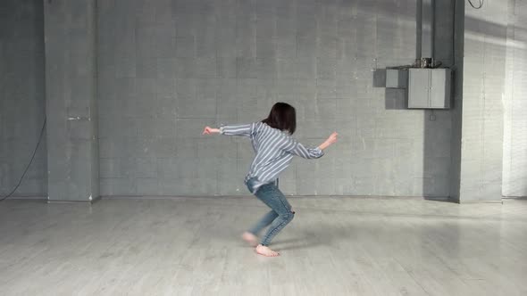 Young Woman Performing Modern Dance