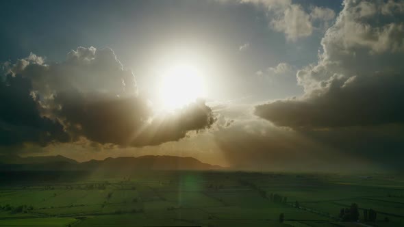 8K Sunbeams Landscape On Vast Plain At Sunset