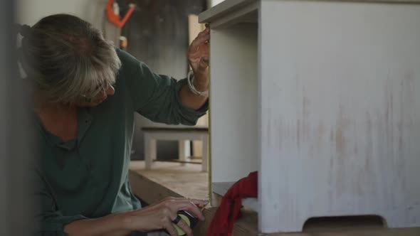 Woman doing DIY at home