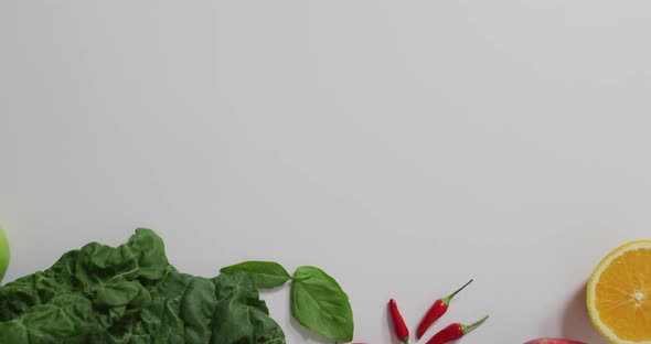 Video of fresh fruit and vegetables on white background