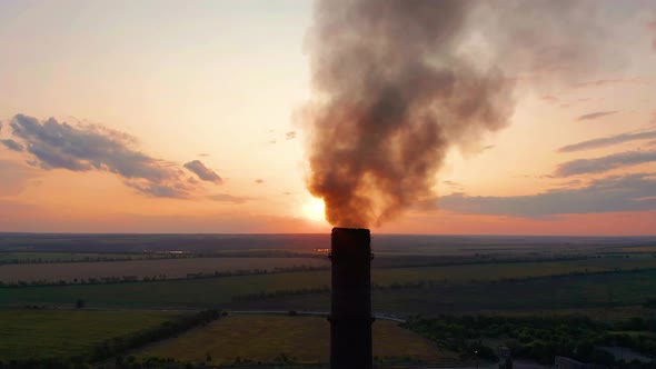 Aerial View. Pipes Throwing Smoke in the Sky. Air Pollution From Industrial Plants