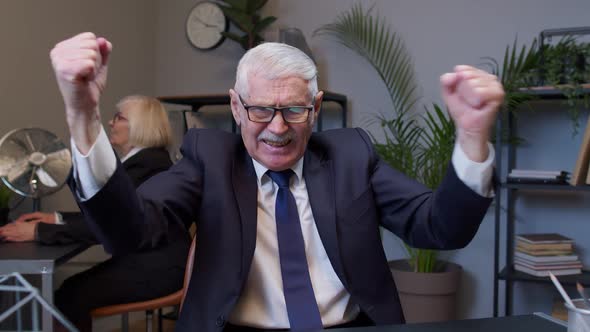 Elderly Man Boss Screaming in Despair After Working Developing New Project but Fails in Office Room