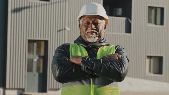 Closeup Elderly African American Man Construction Worker Standing in Protective Helmet Uniform