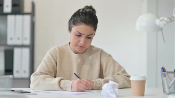 Indian Woman Failing to Write on Paper