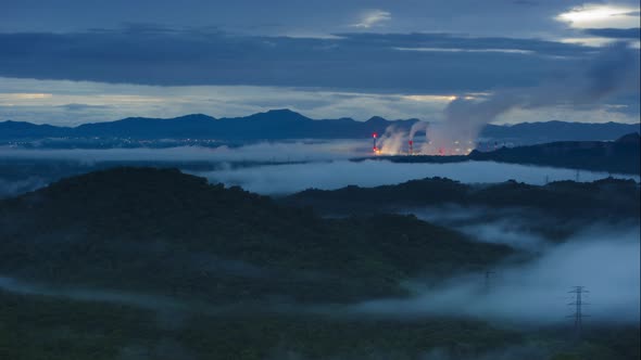 Landscape in the morning time with fog and background Mae moh coal power plant.