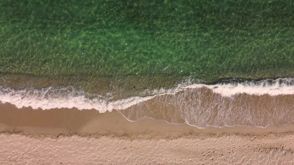 Aerial View of Clear Turquoise Sea and Waves