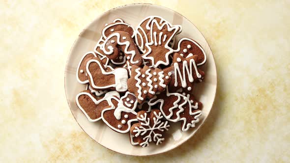 Gingerbread Cookies in Various Christmas Theme Shapes on Plate